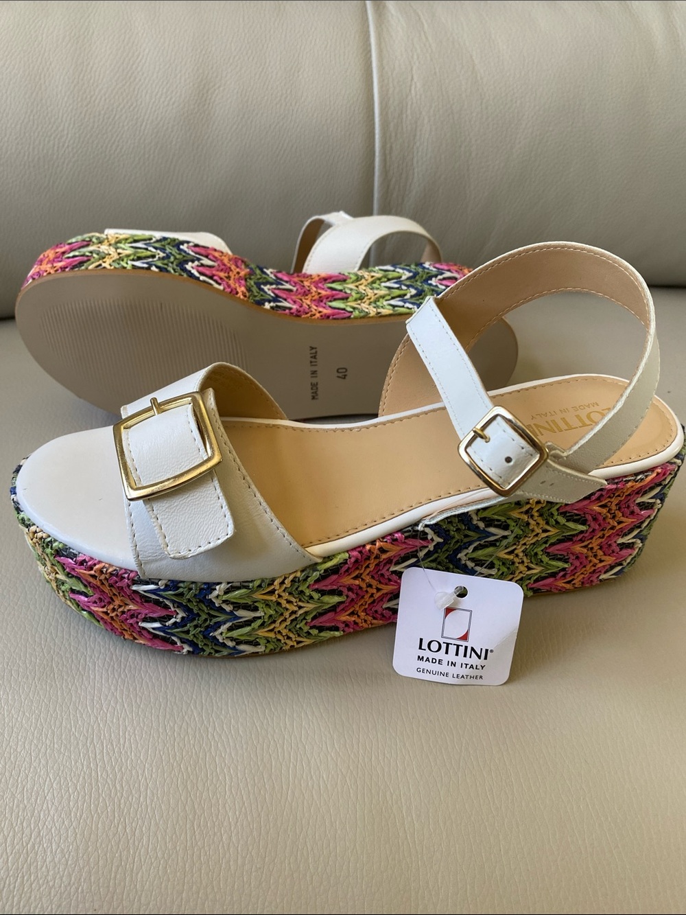 White leather platform sandals by LOTTINI